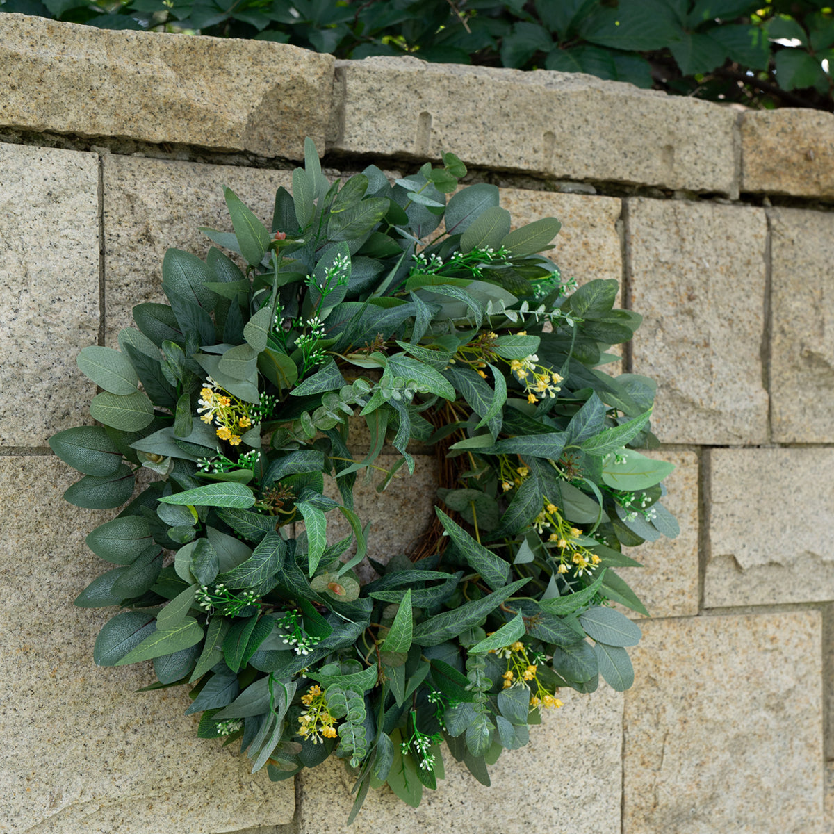 24" Eucalyptus Wreath with Yellow Blossoms